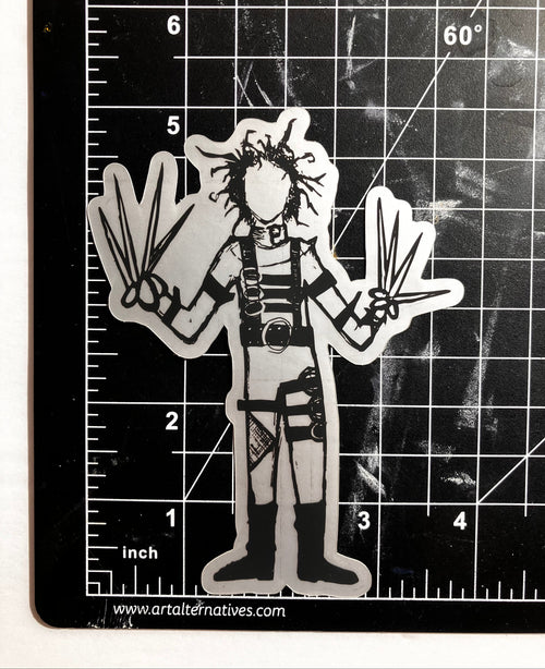 Black and white illustration of Edward Scissorhands on cutting mat